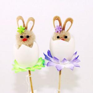 Easter bunny in the egg on the stick